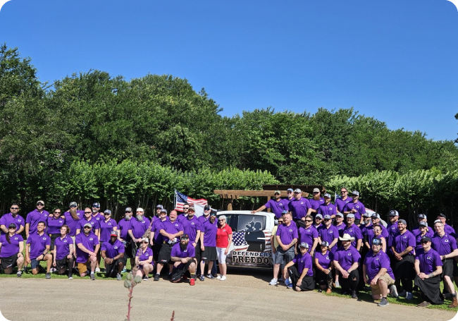 Group photo of Jonas employees at the Defenders of Freedom golf event