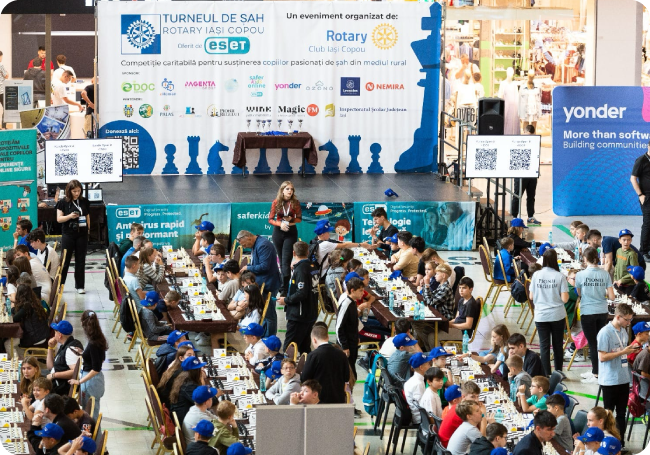 Children participating in Rotary Club Copou's chess tournament