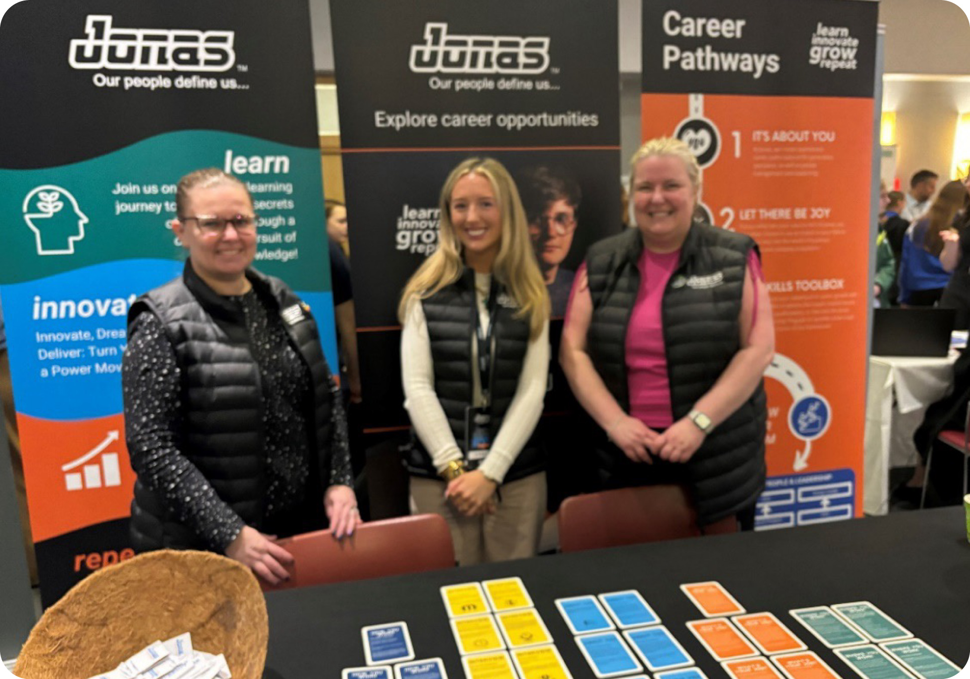 Jonas Software employees promote career opportunities at student careers event.